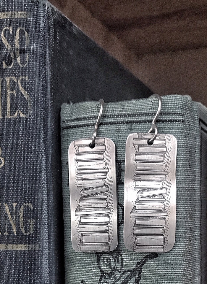 book earrings
